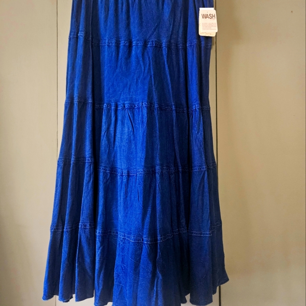 Light denim broom stick skirt. NWT. Very light.